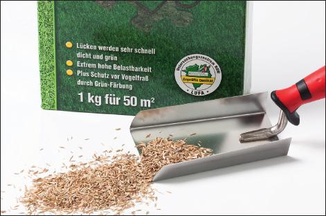 Spreading seed or fertiliser on lawns.